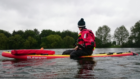 Red and yellow rescue surf ski