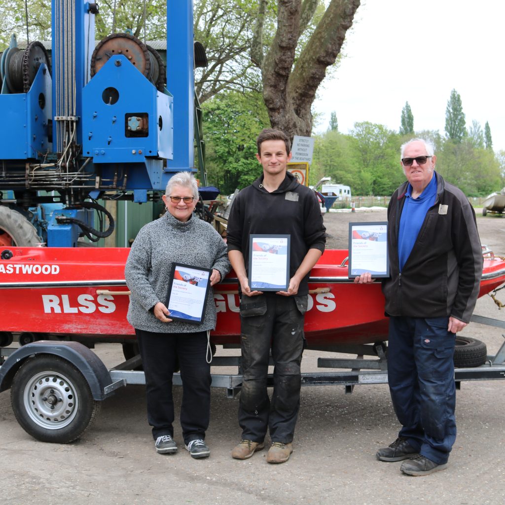 Dilly, Steve and Charlie being presented with awards from the Royal Lifesaving Society 