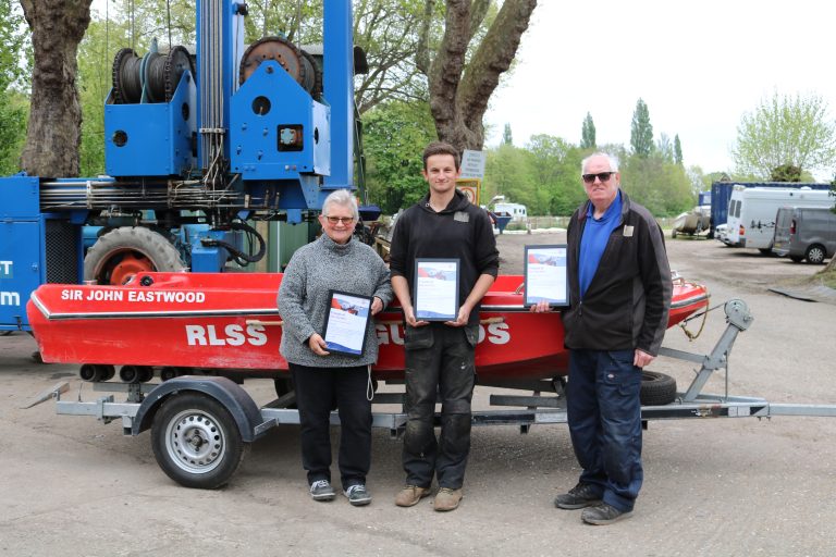 Dillis, Steve and Charlie being presented with awards from the Royal Lifesaving Society
