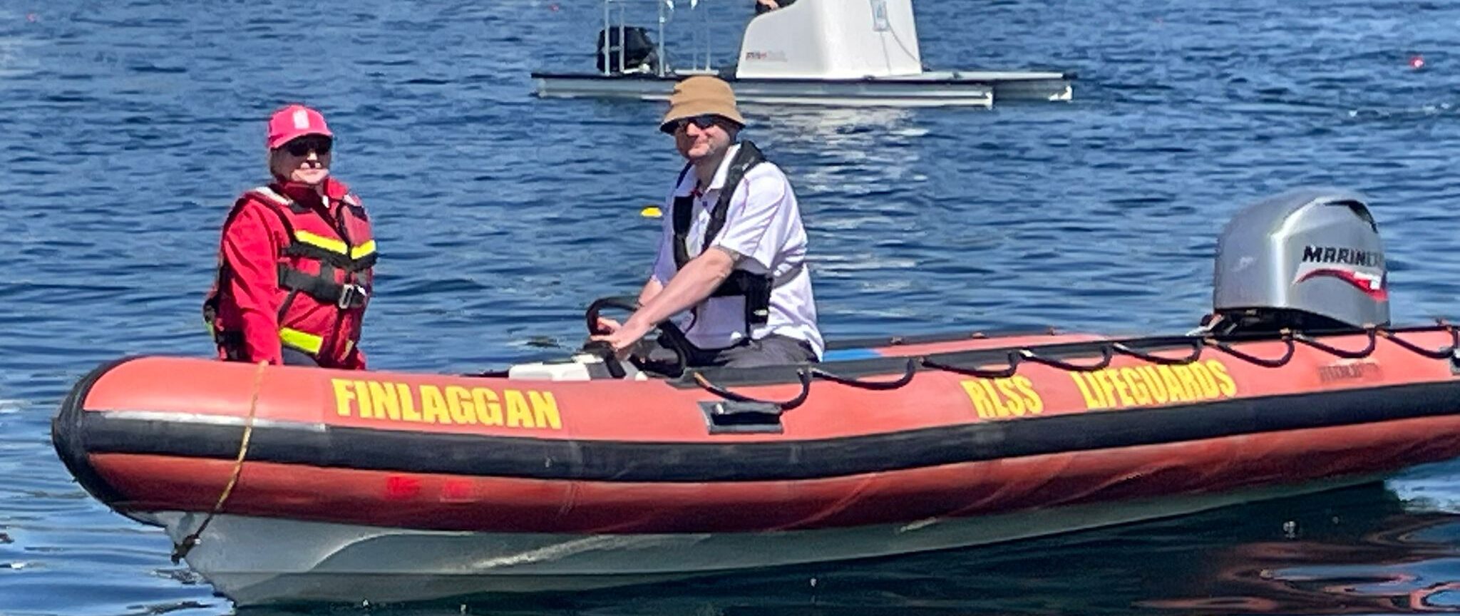 Lifeguards on lifeboat