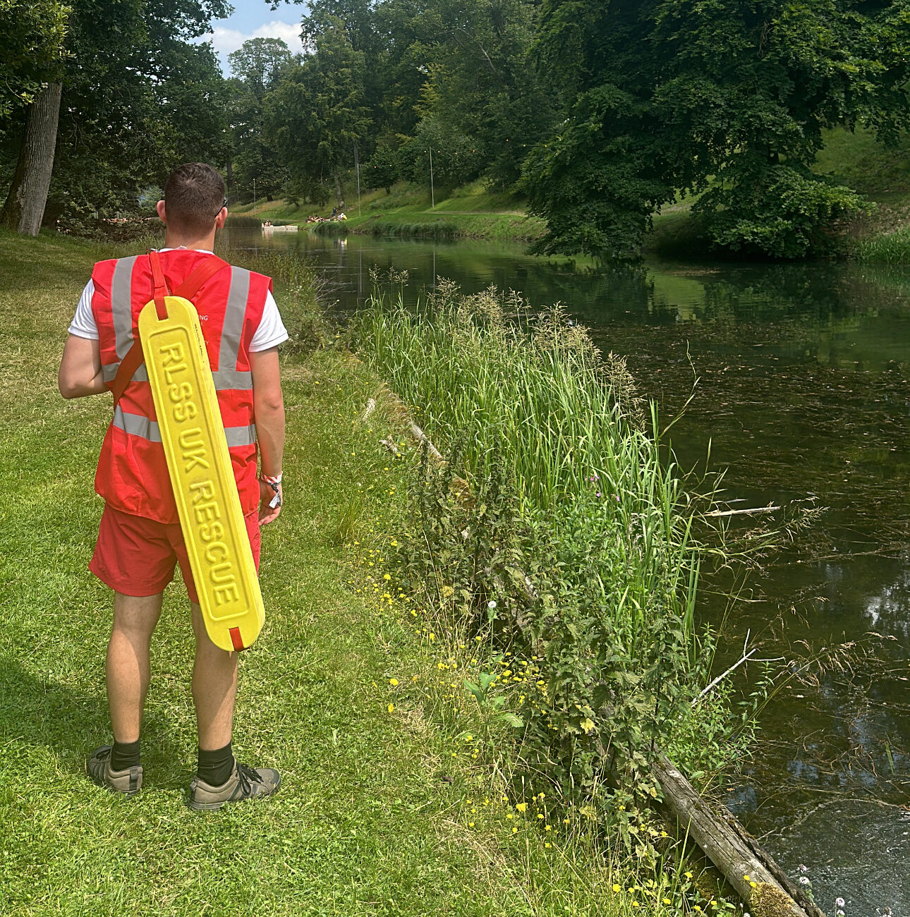 Lifeguard next to lake