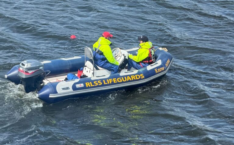 Safety boat on rowing course
