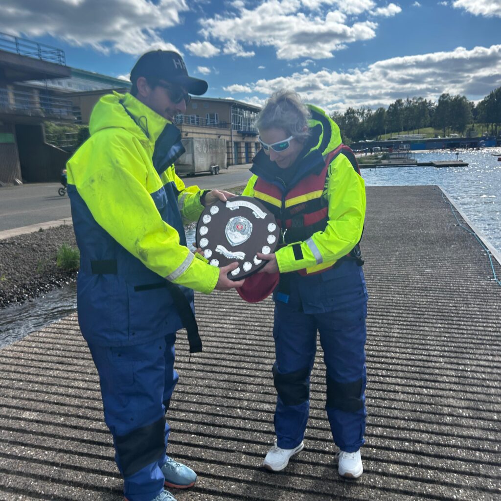 Team member being presented with award
