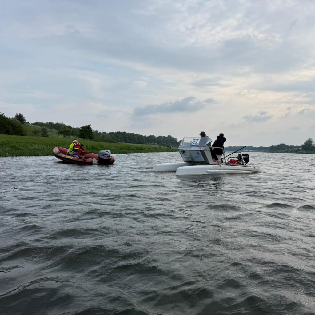 Safety boat with umpire boat
