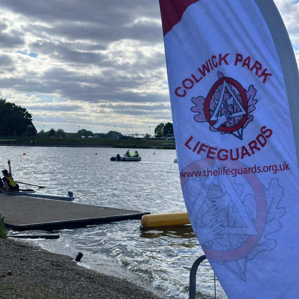 Colwick Park Lifeguards flag next to rowing lake