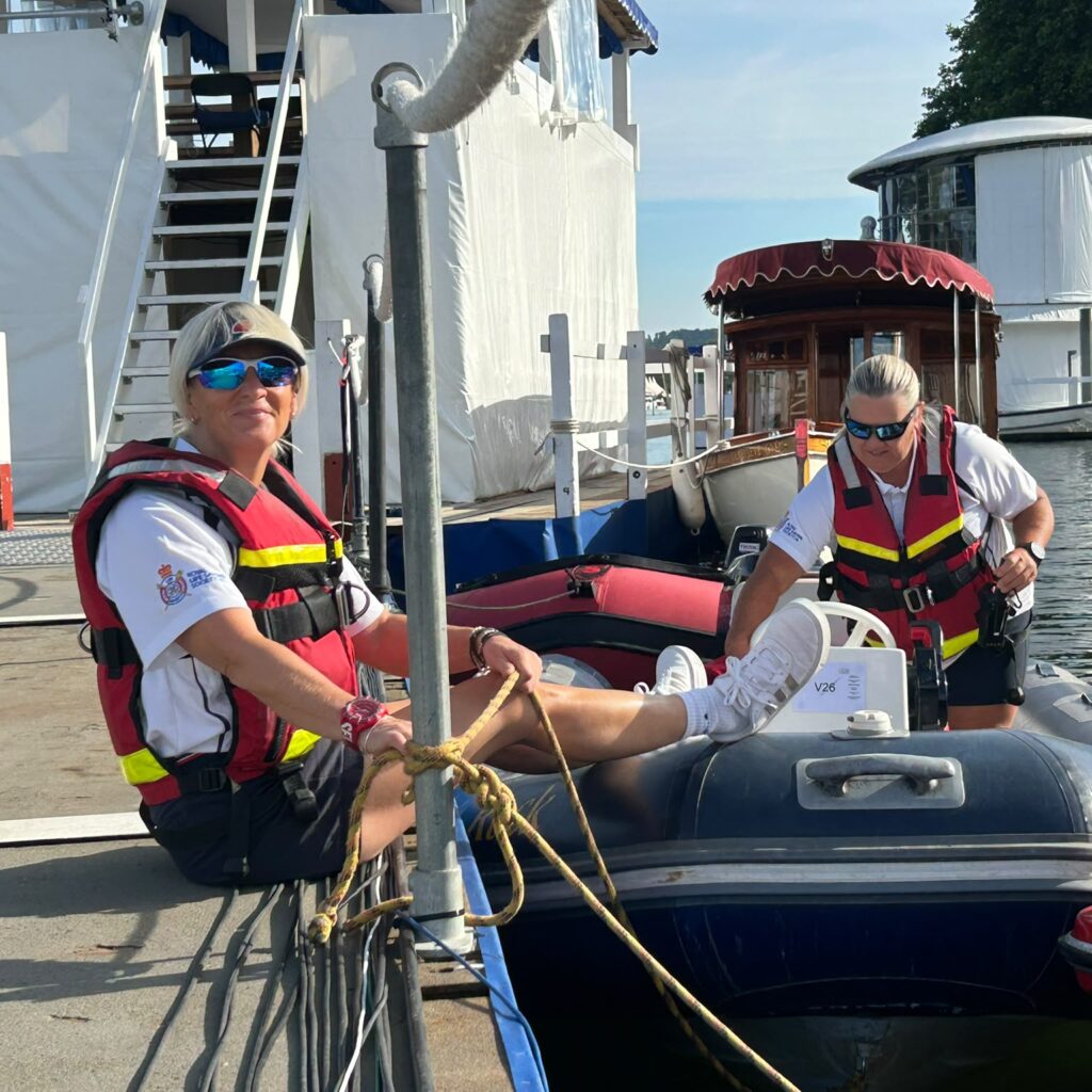Sue Rider tying up safety boat at Henley