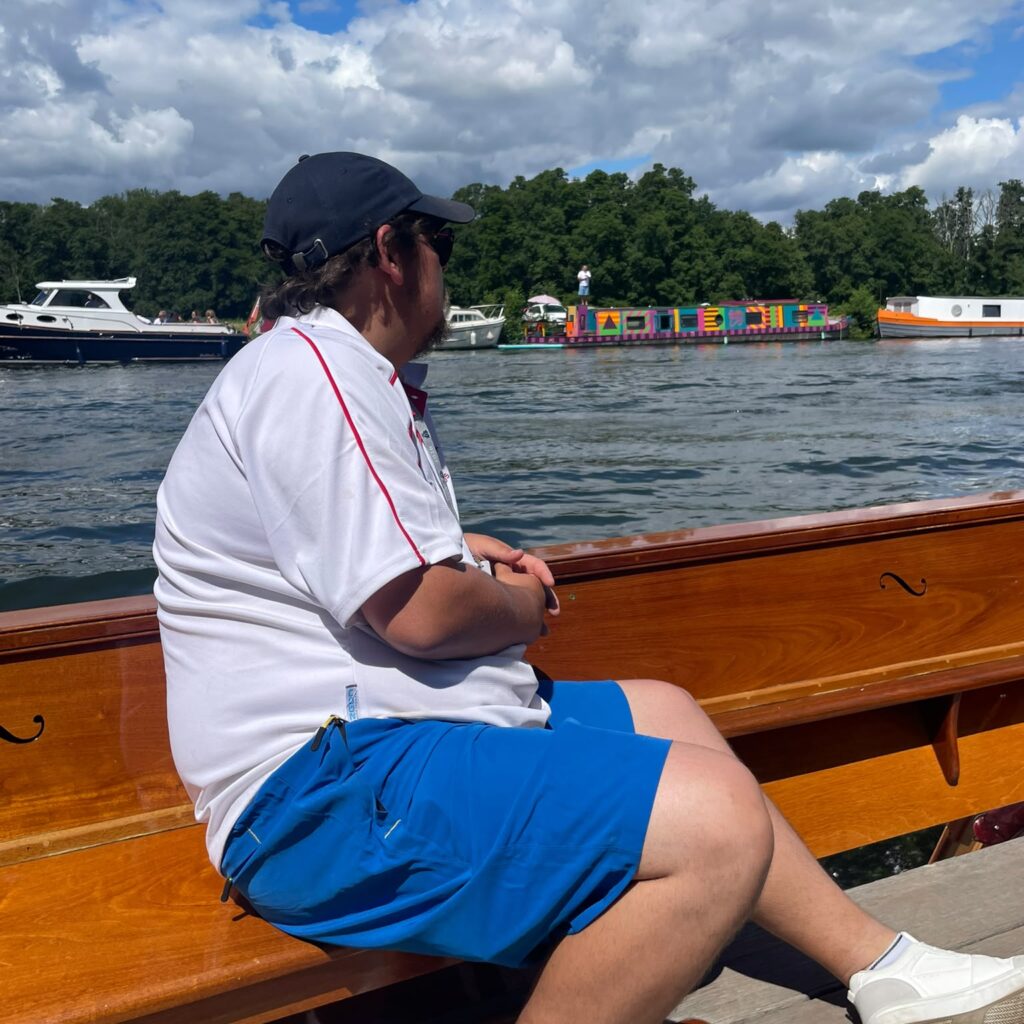 Lifeguard on Umpire launch boat at Henley