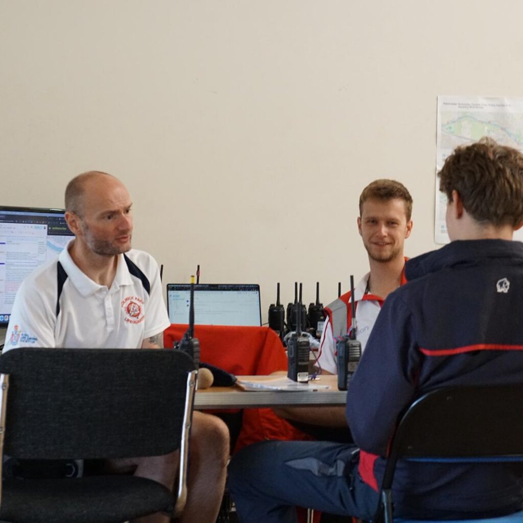 Lifeguard management team at desk talking